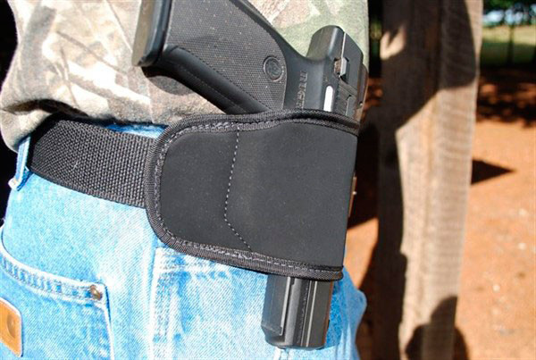 Універсальна поясна кобура GrovTec для невеликих і середніх пістолетів під лівшу 